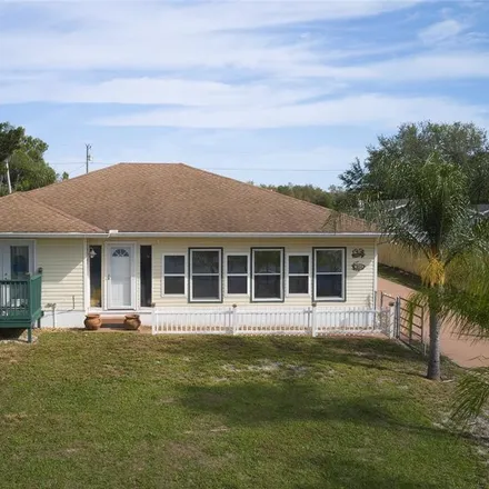 Buy this 4 bed house on 1101 Saint Anne Shrine Road in Polk County, FL 33898