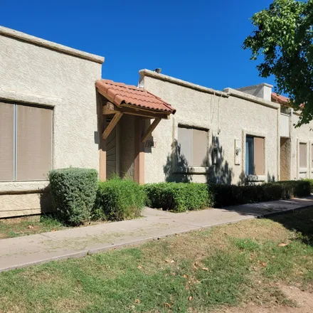Buy this 2 bed townhouse on 3207 West Royal Palm Road in Phoenix, AZ 85051