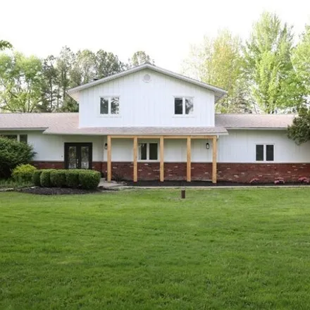 Buy this 4 bed house on 13985 Benner Drive in Russell Township, OH 44072