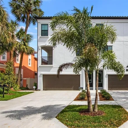 Rent this 4 bed townhouse on 412 South Albany Avenue in Tampa, FL 33606