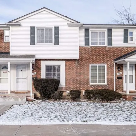 Buy this 2 bed townhouse on 22893 Allen Court in Saint Clair Shores, MI 48080