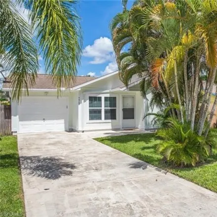 Rent this 2 bed house on 777 98th Avenue North in Collier County, FL 34108