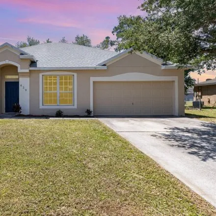 Buy this 3 bed house on 439 Avocado Road Northwest in Palm Bay, FL 32907