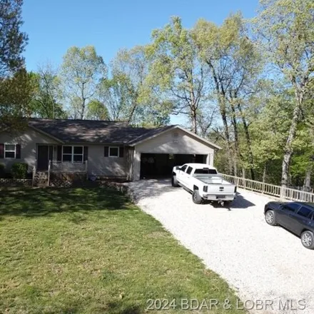 Buy this 3 bed house on 32521 English Gardens Drive in Morgan County, MO 65037