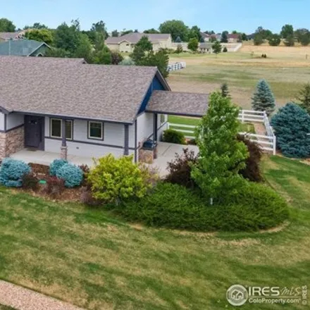 Buy this 4 bed house on 4602 Pendleton Ave in Evans, Colorado