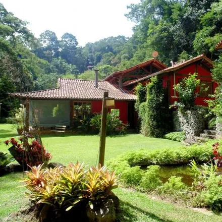Rent this 4 bed house on Estrada Philúvio Cerqueira Rodrigues in Fazenda Santo Antônio, Itaipava - RJ