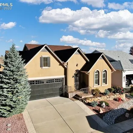 Buy this 4 bed house on 8235 Winding Passage Drive in Colorado Springs, CO 80924