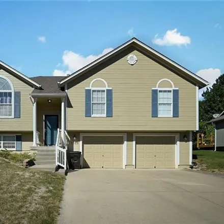 Buy this 3 bed house on 1301 Cotton Wood Avenue in Pleasant Hill, MO 64080