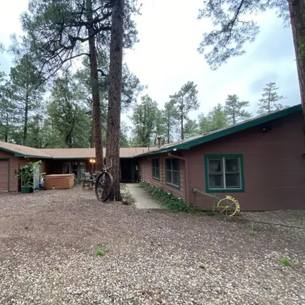 Buy this 4 bed house on Whispering Pines Resort in 237 East White Mountain Boulevard, Pinetop-Lakeside