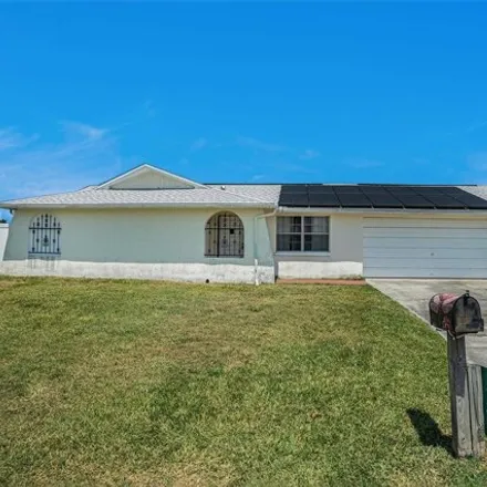 Buy this 4 bed house on 3745 Baden Drive in Holiday, FL 34691