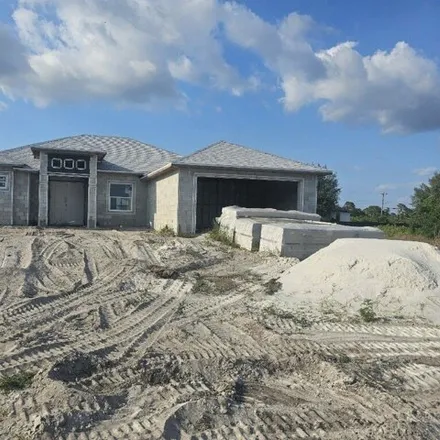 Buy this 4 bed house on 18th Street Southwest in Lehigh Acres, FL 33976