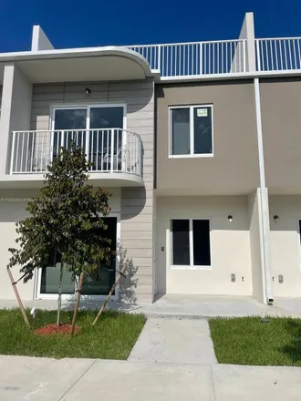 Rent this 4 bed townhouse on Southwest 268th Street @ Southwest 144th Court in Southwest 268th Street, Naranja