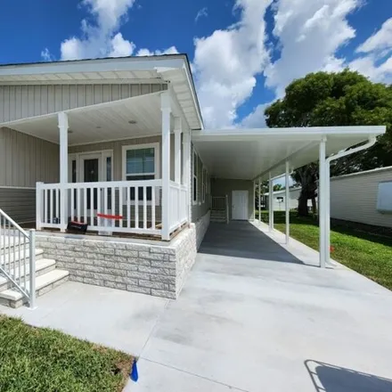 Buy this studio apartment on 9711 Sugarberry Way in Lee County, FL 33905