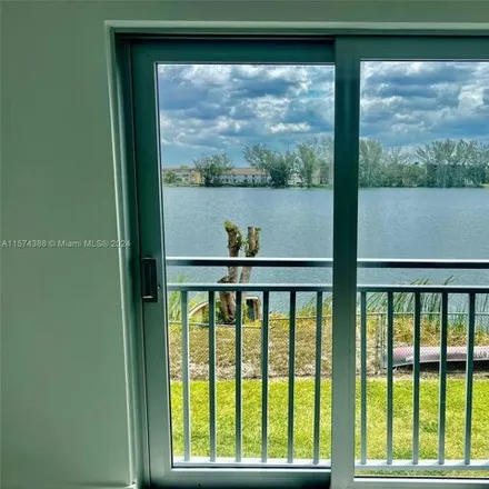 Rent this 2 bed condo on 9915 Okeechobee Frontage Road in Hialeah Gardens, FL 33016