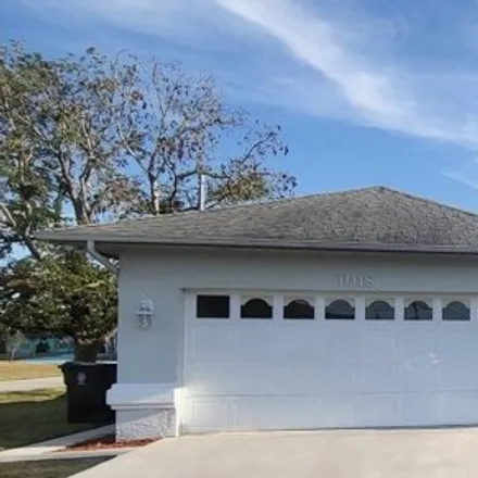 Buy this 3 bed house on 1088 Southwest Cecil Lane in Port Saint Lucie, FL 34953
