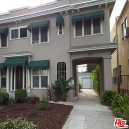 Buy this 4 bed house on 1214 South Tremaine Avenue in Los Angeles, CA 90019