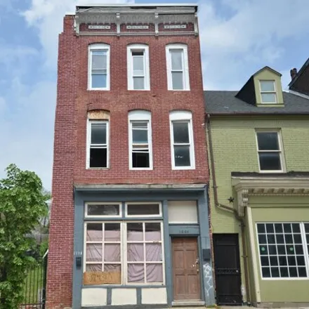 Buy this 4 bed townhouse on 1644 East Pratt Street in Baltimore, MD 21231