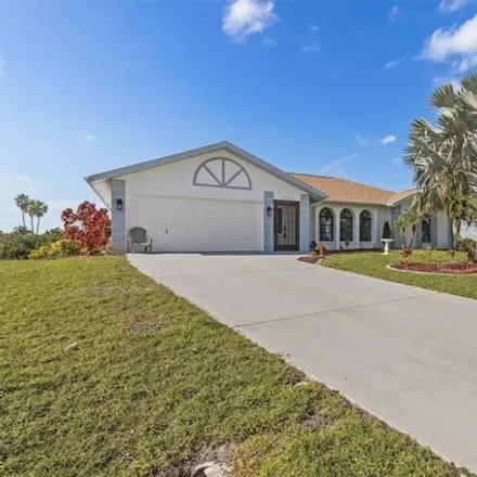 Buy this 3 bed house on 18602 Ayrshire Cir in Port Charlotte, Florida