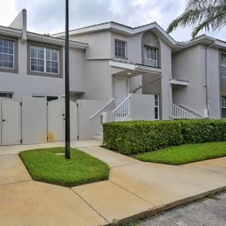 Rent this 2 bed townhouse on Wilshire Lakes Boulevard in Collier County, FL 34109