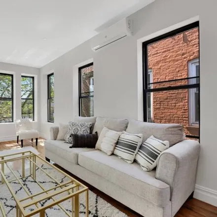 Buy this 6 bed townhouse on 687 Van Siclen Avenue in New York, NY 11207