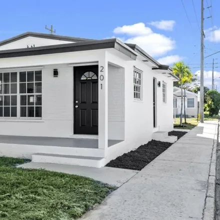 Buy this 2 bed house on 1219 2nd Avenue South in Lake Worth Beach, FL 33460