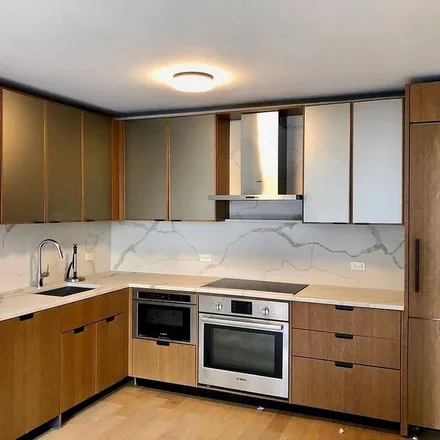 Rent this 3 bed apartment on 404 East 53rd Street in New York, NY 10022