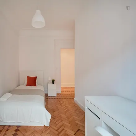 Rent this 6 bed room on LSB-00080 in Rua Gorgel do Amaral, 1250-259 Lisbon