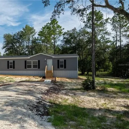 Buy this studio apartment on 10635 Northeast 88th Lane in Levy County, FL 32621