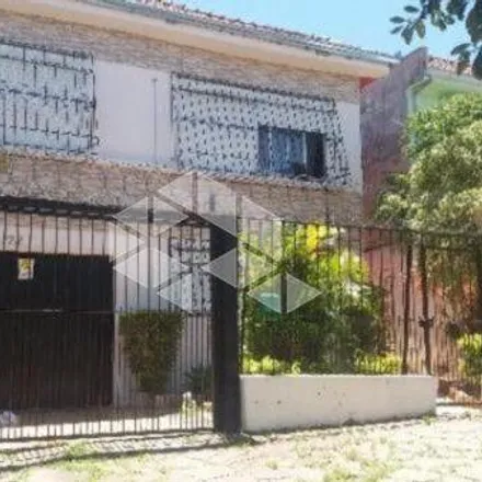 Buy this 4 bed house on Rua Taveira Júnior in Nonoai, Porto Alegre - RS