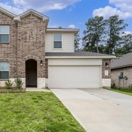 Buy this 4 bed house on Lost Holly Lane in Conroe, TX 77301