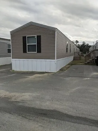 Rent this 3 bed house on Captain D's Seafood in Fairground Road, Moncks Corner