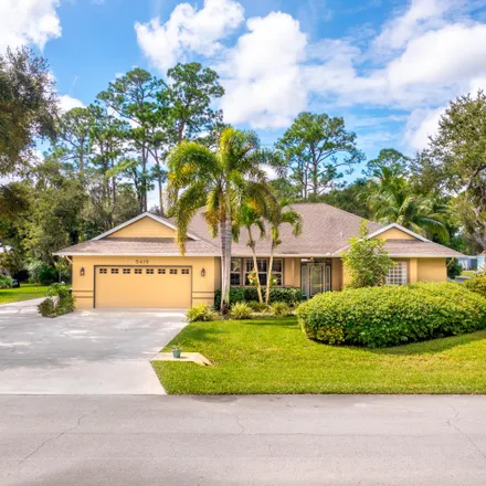 Buy this 3 bed house on 5415 Stately Oaks Street in White City, Saint Lucie County