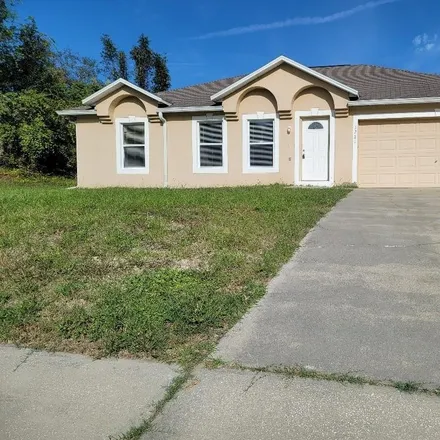 Rent this 3 bed house on 3221 Utah Drive in Deltona, FL 32738