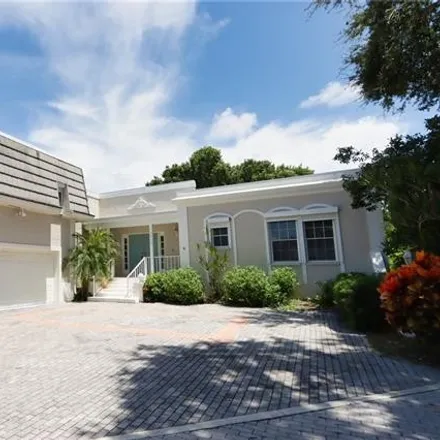 Rent this 4 bed house on 5982 Chanteclair Drive in Pelican Bay, FL 34108