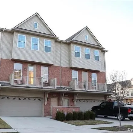 Rent this 2 bed townhouse on 56751 Sunset Drive in Shelby Charter Township, MI 48316