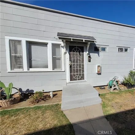 Buy this 8 bed house on 1135 Linden Ave in Long Beach, California
