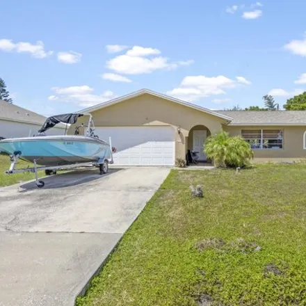 Buy this 3 bed house on 1683 Nona Street Northeast in Palm Bay, FL 32907