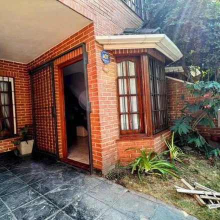 Buy this 3 bed house on Manuel A. Fernández 819 in Partido de Lomas de Zamora, B1834 GMJ Temperley