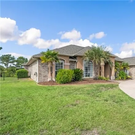 Buy this 4 bed house on 239 Masters Point Court in Oak Harbor, LA 70458