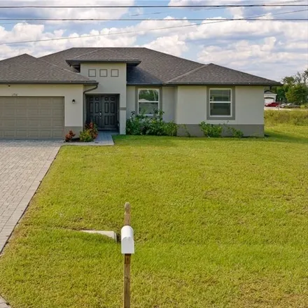 Buy this 3 bed house on 1636 Northeast 10th Lane in Cape Coral, FL 33909