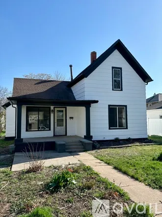 Rent this 3 bed house on 215 W 5th St