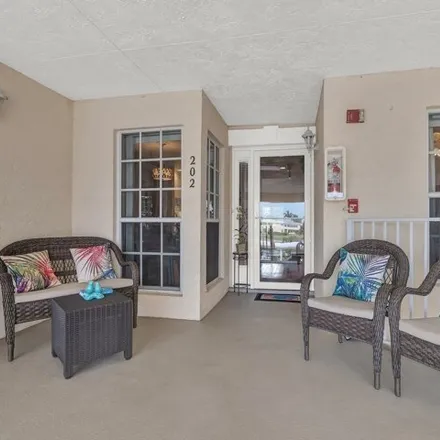 Rent this 2 bed condo on 696 Lake Orchid Circle in Florida Ridge, FL 32962