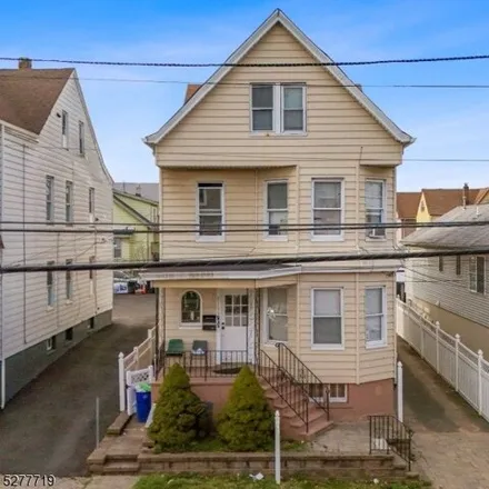 Buy this 6 bed house on 187 North 7th Street in Paterson, NJ 07522