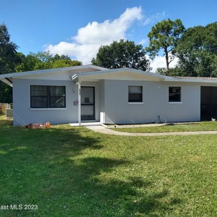 Buy this 3 bed house on 965 Date Ave in Merritt Island, Florida