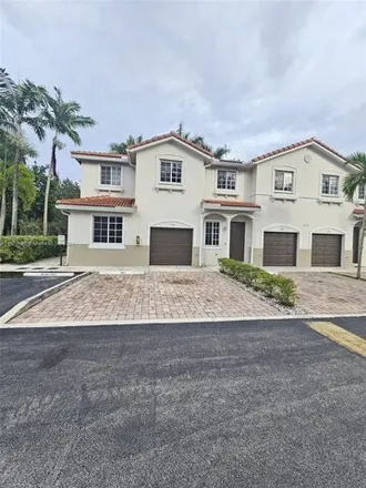 Rent this 4 bed townhouse on 21011 Northwest 14th Place in Miami Gardens, FL 33169