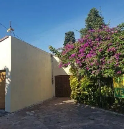 Buy this 3 bed house on Maipú 451 in Bernal Este, B1876 AWD Bernal