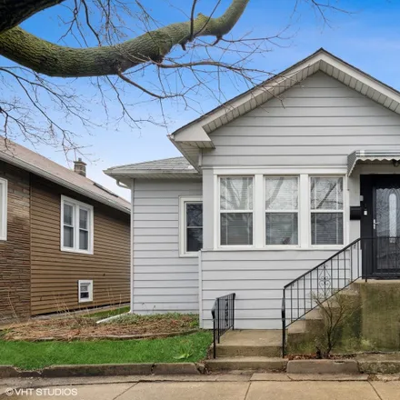 Buy this 2 bed house on 4923 West Drummond Place in Chicago, IL 60639