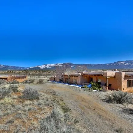 Buy this 3 bed house on 98 Windsong in Taos County, NM 87529