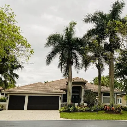 Buy this 4 bed house on 6512 Northwest 99th Avenue in Parkland, FL 33076