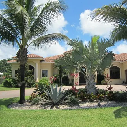 Rent this 5 bed house on 486 North Country Club Drive in Atlantis, Palm Beach County